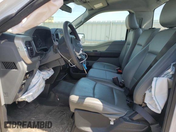 2021 Ford F-150 XL z VIN 1FTMF1E54MKD59565, wystawiony jako Copart lot #54433755 z przebiegiem 15 596 mil mil oraz Szkoda całkowita • Salvage title. Historia ofert i sprzedaży dostępna na DreamBid. Obrazek 7.