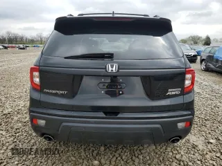 2021 Honda Passport Touring z VIN 5FNYF8H91MB009476, wystawiony jako Copart lot #52449015 z przebiegiem 42 848 mil mil oraz Szkoda całkowita • Salvage title. Historia ofert i sprzedaży dostępna na DreamBid. Obrazek 6.
