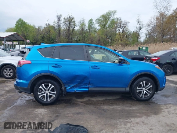 2018 Toyota RAV4 LE with VIN JTMBFREV8JJ220630, listed as a IAAI auction lot 42001795 with 86,027 mi miles. Bid and sale history available at carsss.com. Image 13.