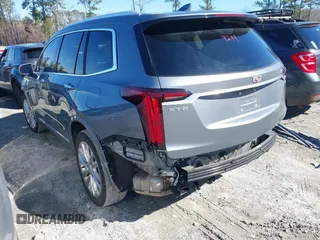 2020 Cadillac XT6 FWD Premium Luxury with VIN 1GYKPCRS3LZ137194, listed as a IAAI auction lot 41569297 with 61,966 mi miles. Bid and sale history available at carsss.com. Image 3.