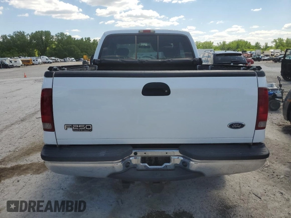 2004 Ford F-250 XL with VIN 1FTNX21P04EA92082, listed as a Copart auction lot 55311935 with 217,363 mi miles and Salvage title. Bid and sale history available at DreamBid. Image 6.
