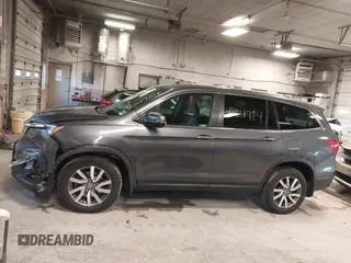 2019 Honda Pilot EX-L with VIN 5FNYF6H50KB035548, listed as a IAAI auction lot 42011724 with 105,195 mi miles and . Bid and sale history available at DreamBid. Image 14.