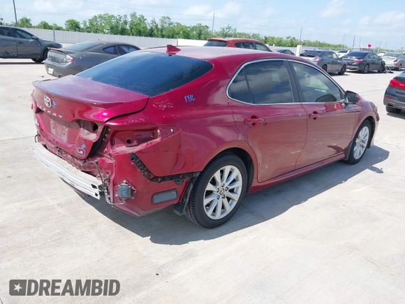 2020 Toyota Camry LE with VIN 4T1L11AK3LU993342, listed as a IAAI auction lot 42033420 with 84,849 mi miles and . Bid and sale history available at DreamBid. Image 4.