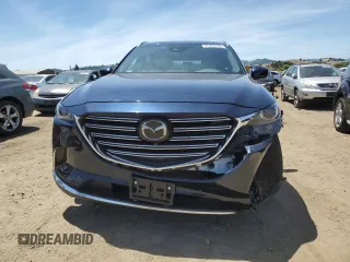 2021 Mazda CX-9 Grand Touring with VIN JM3TCBDY6M0520443, listed as a Copart auction lot 57403735 with 31,414 mi miles and Salvage title. Bid and sale history available at DreamBid. Image 5.