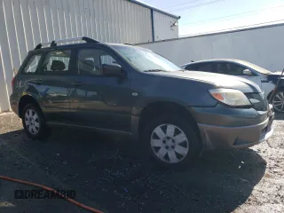 2005 Mitsubishi Outlander LS with VIN JA4LX31F65U020745, listed as a Copart auction lot 86270664 with 76,633 mi miles and Salvage Title. Bid and sale history available at carsss.com. Image 4.