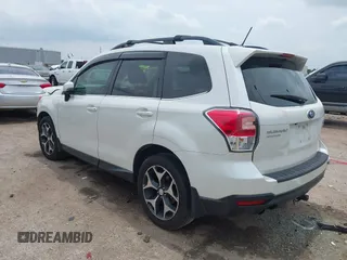 2014 Subaru Forester XT Touring with VIN JF2SJGMC4EH555465, listed as a IAAI auction lot 42357371 with 168,378 mi miles and . Bid and sale history available at DreamBid. Image 3.