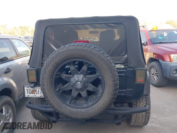 2011 Jeep Wrangler Rubicon with VIN 1J4BA6D10BL628180, listed as a IAAI auction lot 41711065 with 155,940 mi miles and . Bid and sale history available at carsss.com. Image 16.