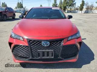 2021 Toyota Avalon Hybrid XSE z VIN 4T1EA1AB6MU006954, wystawiony jako Copart lot #51970855 z przebiegiem 61 806 mil mil oraz Szkoda całkowita • Salvage title. Historia ofert i sprzedaży dostępna na DreamBid. Obrazek 5.