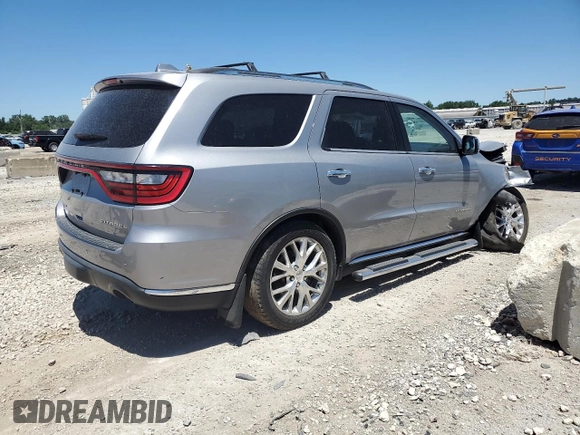 2014 Dodge Durango Citadel with VIN 1C4SDJETXEC451206, listed as a Copart auction lot 57917044 with 139,200 mi miles and Salvage Title. Bid and sale history available at DreamBid. Image 3.