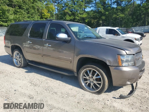 2013 Chevrolet Suburban LS with VIN 1GNSCHE04DR274687, listed as a Copart auction lot 67646174 with 184,268 mi miles and Salvage Title. Bid and sale history available at carsss.com. Image 4.