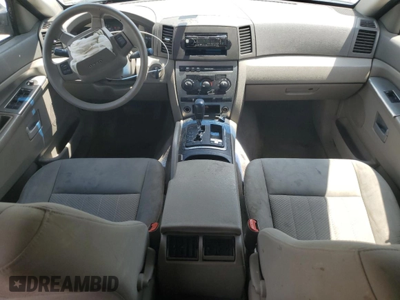 2005 Jeep Grand Cherokee Laredo with VIN 1J4HR48N65C608296, listed as a Copart auction lot 58862875 with 168,421 mi miles and Salvage title. Bid and sale history available at DreamBid. Image 8.