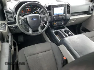 2019 Ford F-150 XL with VIN 1FTEW1E54KKE61689, listed as a Copart auction lot 87960225 with 94,355 mi miles and Salvage Title. Bid and sale history available at carsss.com. Image 8.