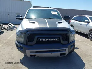 2016 Ram 1500 Rebel z VIN 1C6RR7YT5GS251994, wystawiony jako IAAI lot #42139378 z przebiegiem 102 736 mil mil oraz . Historia ofert i sprzedaży dostępna na DreamBid. Obrazek 12.