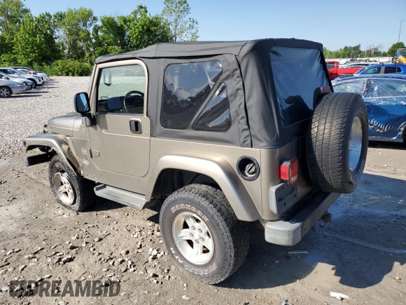 2004 Jeep Wrangler Sahara with VIN 1J4FA59S14P755450, listed as a Copart auction lot 58558005 with 194,044 mi miles and Salvage title. Bid and sale history available at DreamBid. Image 2.