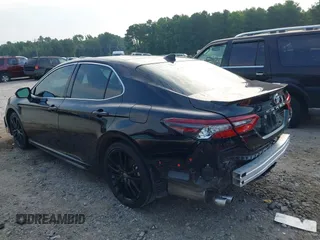 2022 Toyota Camry XSE z VIN 4T1K61AK7NU499890, wystawiony jako IAAI lot #39839639 z przebiegiem 103 043 mil mil oraz . Historia ofert i sprzedaży dostępna na DreamBid. Obrazek 3.