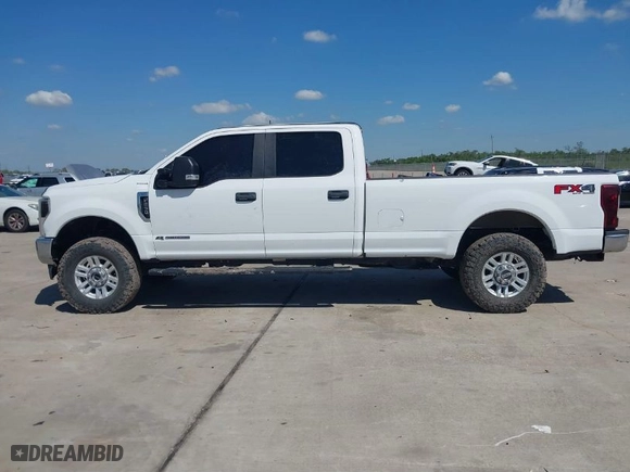 2019 Ford Super Duty F-250 SRW XL with VIN 1FT7W2BT9KEC89689, listed as a IAAI auction lot 40381550 with 214,406 mi miles. Bid and sale history available at carsss.com. Image 14.