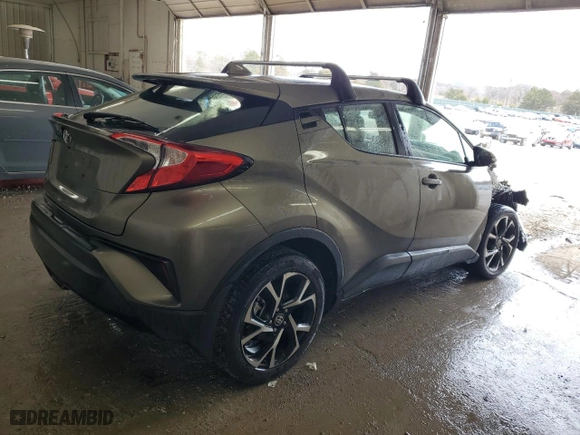 2021 Toyota C-HR LE with VIN JTNKHMBX4M1110290, listed as a Copart auction lot 48125205 with 100,242 mi miles and Salvage Title. Bid and sale history available at carsss.com. Image 3.