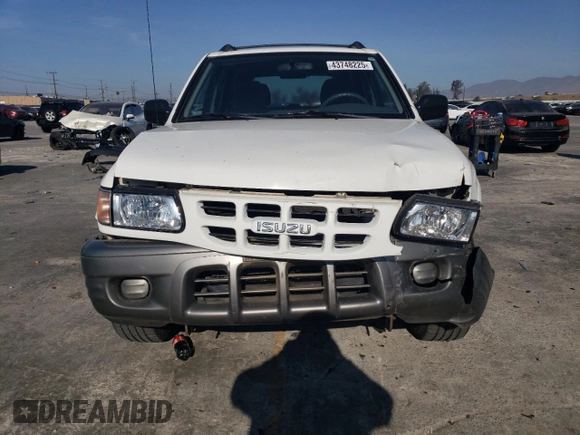 2001 Isuzu Rodeo S with VIN 4S2CK58W914331185, listed as a Copart auction lot 43748225 with 138,882 mi miles and Salvage Title. Bid and sale history available at DreamBid. Image 5.
