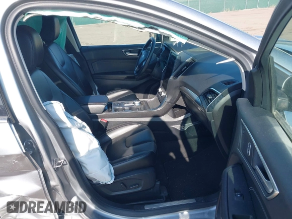 2022 Ford Edge Titanium z VIN 2FMPK4K95NBA33637, wystawiony jako IAAI lot #42074777 z przebiegiem 58 733 mil mil oraz . Historia ofert i sprzedaży dostępna na DreamBid. Obrazek 5.