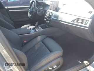 2023 BMW 5 Series 530i with VIN WBA53BH0XPCN25845, listed as a IAAI auction lot 42226987 with 25,717 mi miles and . Bid and sale history available at DreamBid. Image 5.