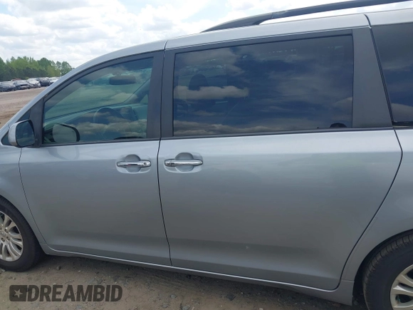 2015 Toyota Sienna XLE with VIN 5TDYK3DC9FS532310, listed as a IAAI auction lot 41990553 with 75,133 mi miles and . Bid and sale history available at DreamBid. Image 15.