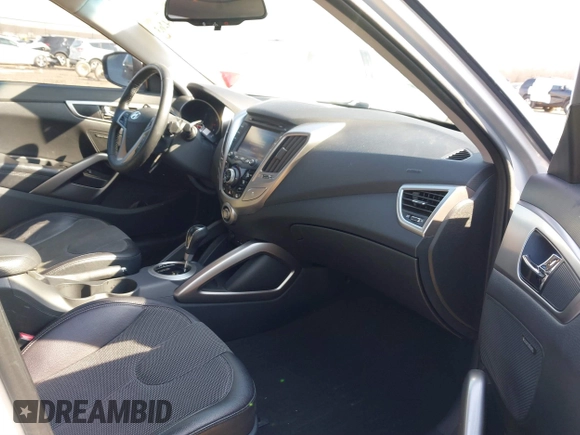 2012 Hyundai Veloster w/Black Int with VIN KMHTC6AD7CU063968, listed as a IAAI auction lot 41764263 with 83,634 mi miles and . Bid and sale history available at DreamBid. Image 5.