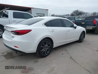 2017 Mazda 6 Grand Touring with VIN JM1GL1W57H1126716, listed as a IAAI auction lot 41619715 with 105,332 mi miles and . Bid and sale history available at DreamBid. Image 4.