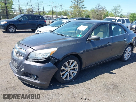 2013 Chevrolet Malibu LTZ with VIN 1G11J5SX6DF335333, listed as a IAAI auction lot 42135480 with 158,743 mi miles and . Bid and sale history available at DreamBid. Image 2.
