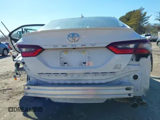 2023 Toyota Camry SE z VIN 4T1G11BK2PU076186, wystawiony jako IAAI lot #41602143 z przebiegiem 18 307 mil mil oraz . Historia ofert i sprzedaży dostępna na DreamBid. Obrazek 18.