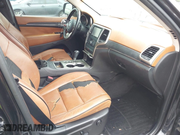 2012 Jeep Grand Cherokee Overland with VIN 1C4RJECT3CC281835, listed as a IAAI auction lot 41994148 with 145,741 mi miles. Bid and sale history available at carsss.com. Image 5.