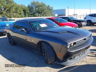 2016 Dodge Challenger 392 Hemi Scat Pack Shaker z VIN 2C3CDZFJ7GH184725, wystawiony jako IAAI lot #41076829 z przebiegiem 134 877 mil mil oraz . Historia ofert i sprzedaży dostępna na DreamBid. Obrazek 1.