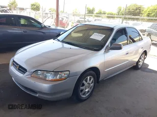 2002 Honda Accord SE z VIN JHMCG66892C011913, wystawiony jako IAAI lot #42323509 z przebiegiem 226 288 mil mil oraz . Historia ofert i sprzedaży dostępna na DreamBid. Obrazek 17.