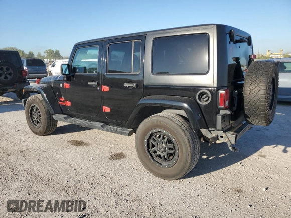 2015 Jeep Wrangler Unlimited Sahara with VIN 1C4BJWEG2FL690498, listed as a Copart auction lot 73598124 with 143,564 mi miles and Salvage Title. Bid and sale history available at carsss.com. Image 2.
