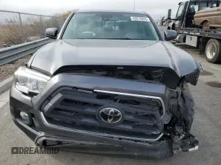 2021 Toyota Tacoma SR with VIN 3TYAX5GN7MT021255, listed as a Copart auction lot 42616935 with 64,626 mi miles and Salvage title. Bid and sale history available at DreamBid. Image 5.