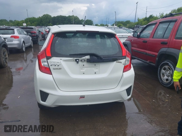 2015 Honda Fit LX with VIN 3HGGK5H52FM775462, listed as a IAAI auction lot 42549634 with 167,391 mi miles and . Bid and sale history available at DreamBid. Image 16.