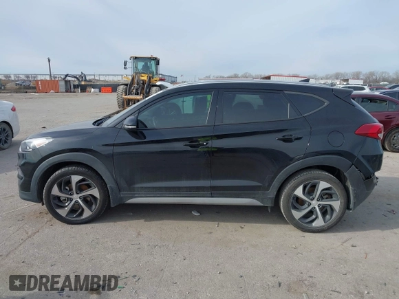 2018 Hyundai Tucson Sport with VIN KM8J33AL7JU772152, listed as a IAAI auction lot 41285203 with 87,188 mi miles. Bid and sale history available at carsss.com. Image 14.