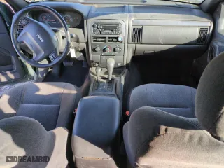 2001 Jeep Grand Cherokee Laredo with VIN 1J4GW48N21C570404, listed as a Copart auction lot 85996954 with 153,838 mi miles and Salvage Title. Bid and sale history available at carsss.com. Image 8.