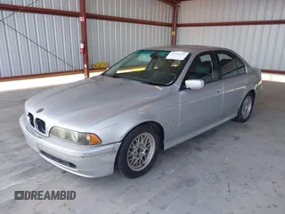 2002 BMW 5 Series 540i z VIN WBADN63412GN86932, wystawiony jako IAAI lot #42322111 z przebiegiem 143 949 mil mil oraz . Historia ofert i sprzedaży dostępna na DreamBid. Obrazek 2.