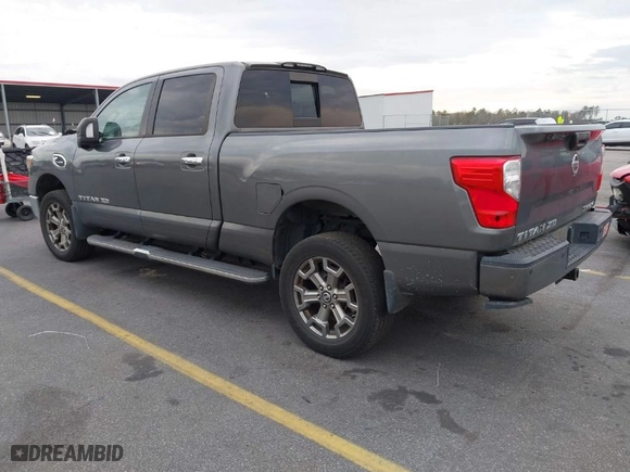 2019 Nissan Titan XD SV with VIN 1N6BA1F47KN507177, listed as a IAAI auction lot 41470719 with 114,232 mi miles. Bid and sale history available at carsss.com. Image 3.