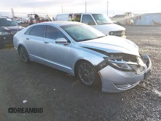 2015 Lincoln MKZ Hybrid z VIN 3LN6L2LU7FR614253, wystawiony jako IAAI lot #40872678 z przebiegiem 185 637 mil mil oraz . Historia ofert i sprzedaży dostępna na DreamBid. Obrazek 1.