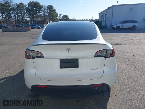 2023 Tesla Model Y Performance with VIN 7SAYGDEF3PF711497, listed as a IAAI auction lot 41877450 with 21,887 mi miles and . Bid and sale history available at DreamBid. Image 16.