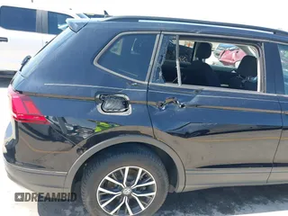 2021 Volkswagen Tiguan S with VIN 3VV1B7AX9MM067347, listed as a IAAI auction lot 42305101 with 77,042 mi miles and . Bid and sale history available at DreamBid. Image 6.