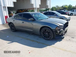 2012 Dodge Charger SE with VIN 2C3CDXBG3CH117581, listed as a IAAI auction lot 41897204 with 176,108 mi miles. Bid and sale history available at carsss.com. Image 1.
