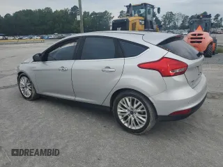 2017 Ford Focus Titanium with VIN 1FADP3N27HL251297, listed as a Copart auction lot 67373094 with 104,733 mi miles and Salvage Title. Bid and sale history available at carsss.com. Image 2.