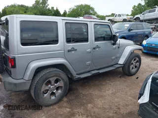 2016 Jeep Wrangler Unlimited Sahara z VIN 1C4BJWEGXGL280016, wystawiony jako IAAI lot #42620102 z przebiegiem 128 232 mil mil oraz . Historia ofert i sprzedaży dostępna na DreamBid. Obrazek 14.