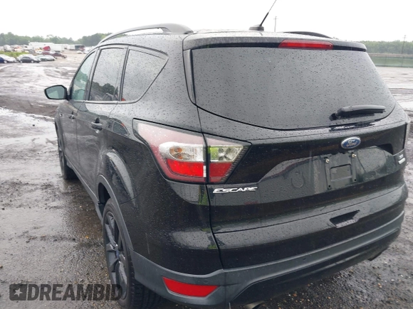 2017 Ford Escape SE with VIN 1FMCU0GD3HUD07141, listed as a IAAI auction lot 42250771 with 116,086 mi miles and . Bid and sale history available at DreamBid. Image 22.
