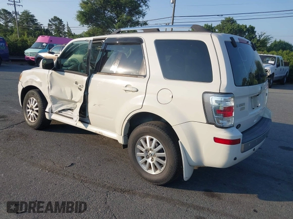 2011 Mercury Mariner Premier with VIN 4M2CN8HG0BKJ02401, listed as a IAAI auction lot 42579483 with 126,276 mi miles and . Bid and sale history available at DreamBid. Image 3.