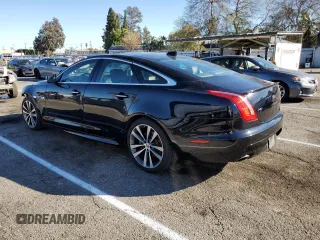 2018 Jaguar XJ with VIN SAJWA1C79J8W14555, listed as a Copart auction lot 39950303 with 86,316 mi miles. Bid and sale history available at carsss.com. Image 2.