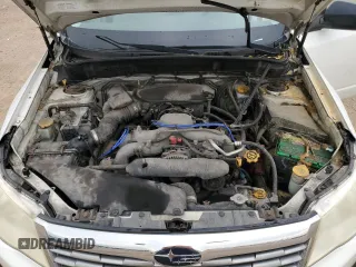 2010 Subaru Forester X with VIN JF2SH6BC1AH907730, listed as a Copart auction lot 58852705 with 144,283 mi miles and Salvage title. Bid and sale history available at DreamBid. Image 11.