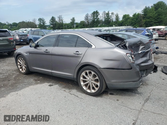 2014 Ford Taurus Limited with VIN 1FAHP2F88EG102674, listed as a Copart auction lot 62841285 with 107,378 mi miles and Salvage title. Bid and sale history available at DreamBid. Image 2.